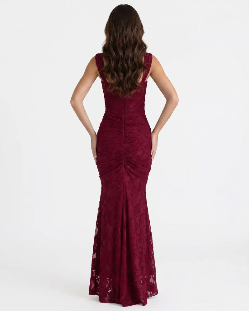 Back view of burgundy lace corset midi dress with wide straps, center seam and gathered ruching