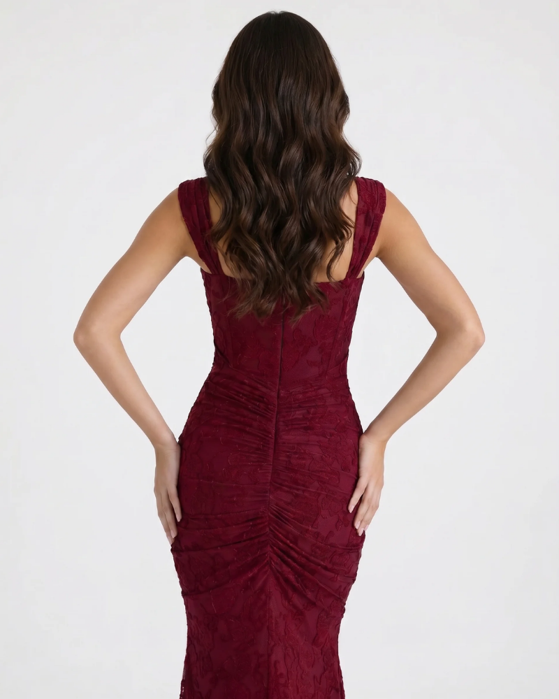 Close back detail of burgundy corset midi dress showing lace texture, center seam and ruched hips