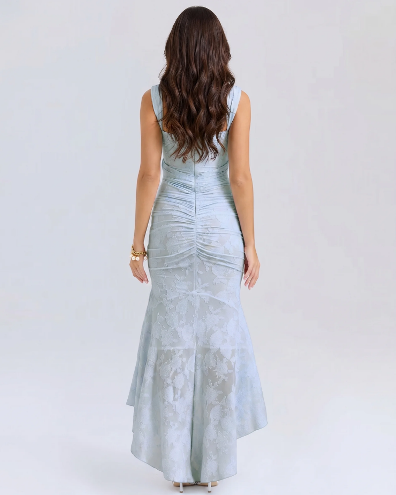 Back view of light blue corset midi dress showing wide straps, back zipper, and ruched seams