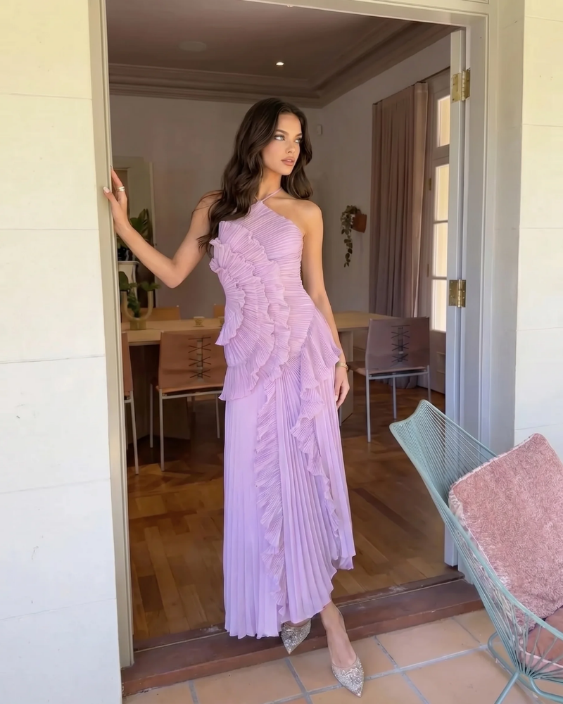 Side view of lavender ruffle maxi dress with pleated skirt and asymmetrical layered bodice