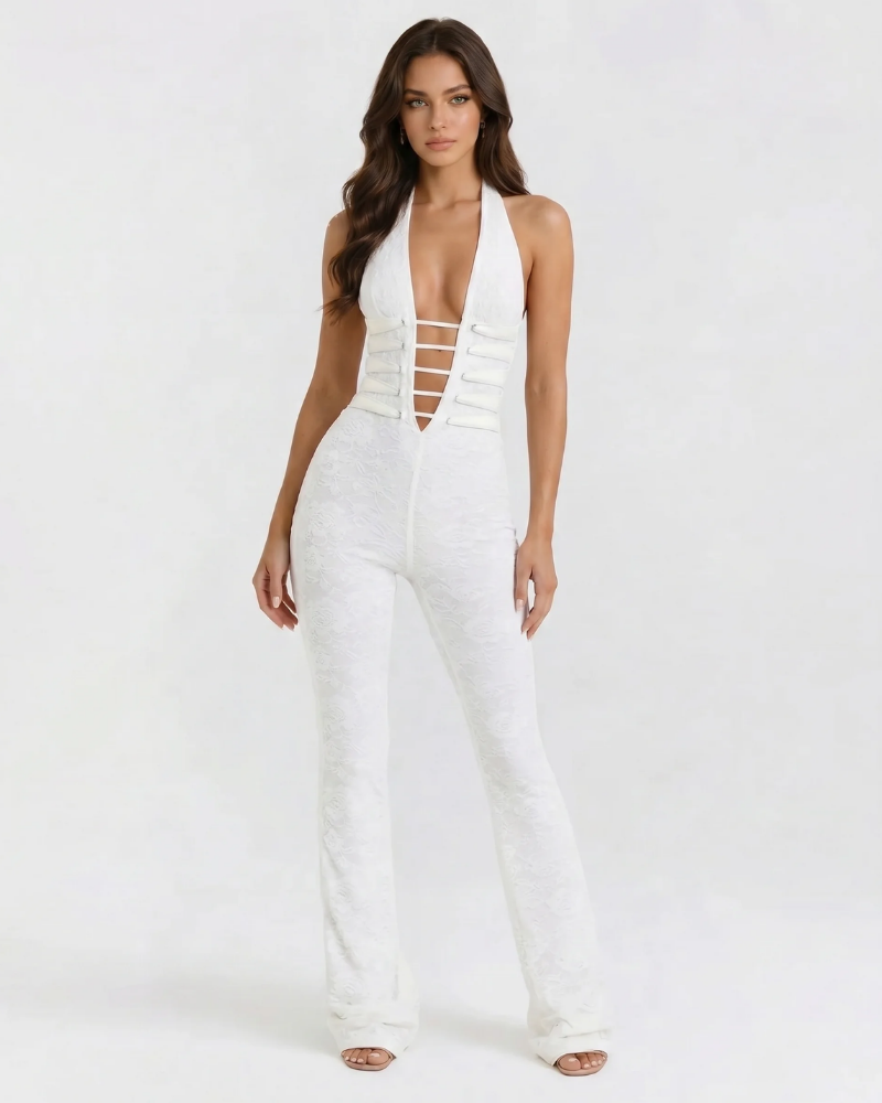 Angled front view of white corset jumpsuit, halter neck and deep V with horizontal strap cutouts, long legs