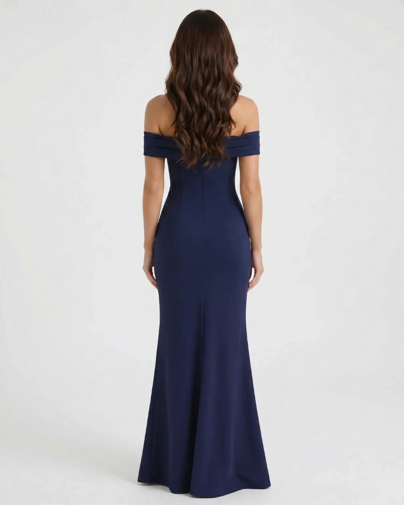 Full back view of navy off-shoulder maxi dress with fitted bodice and floor-length skirt