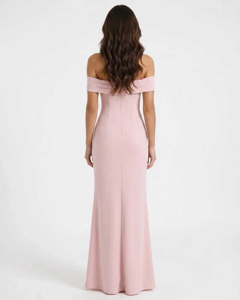Back view of pink ruched maxi dress with off-shoulder neckline and straight floor-length hem