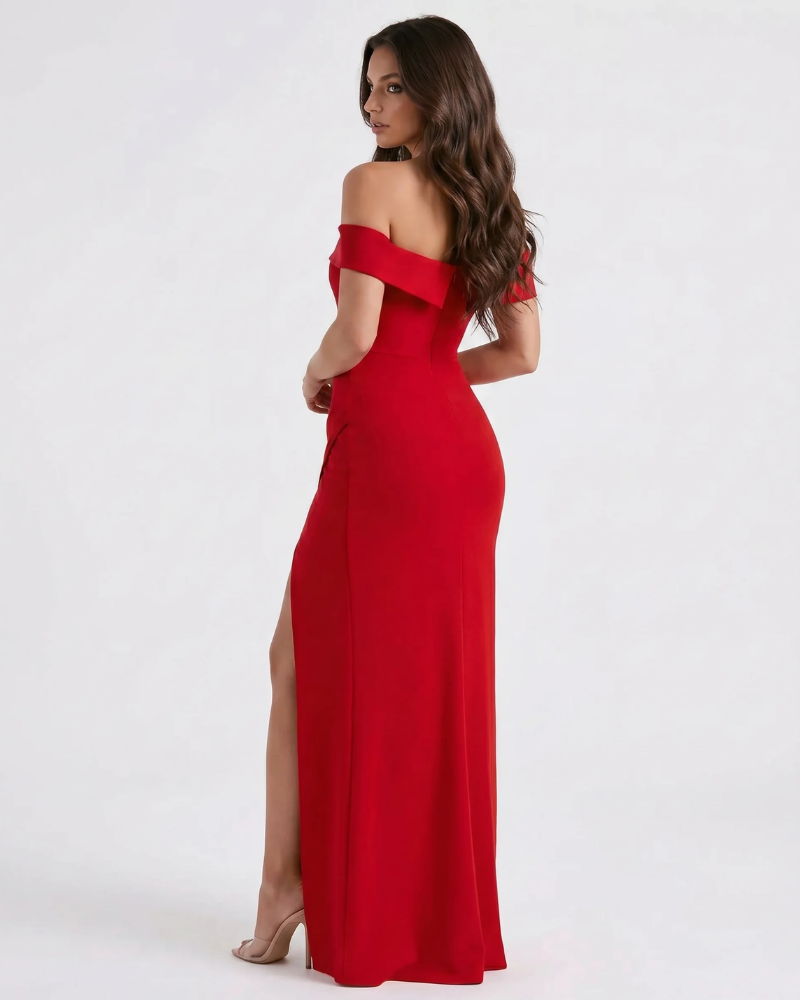 Back-angled view of red off-shoulder maxi dress with sleek fit and thigh slit detail