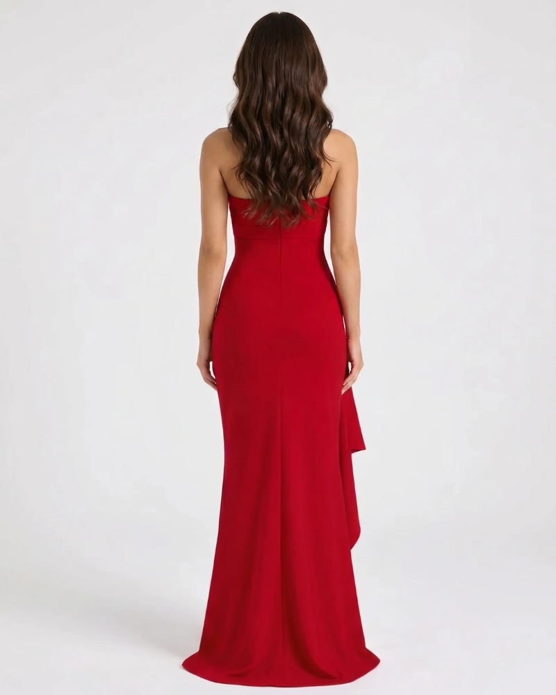 Full back view of red maxi dress with straight back, fitted silhouette, and floor-length hem