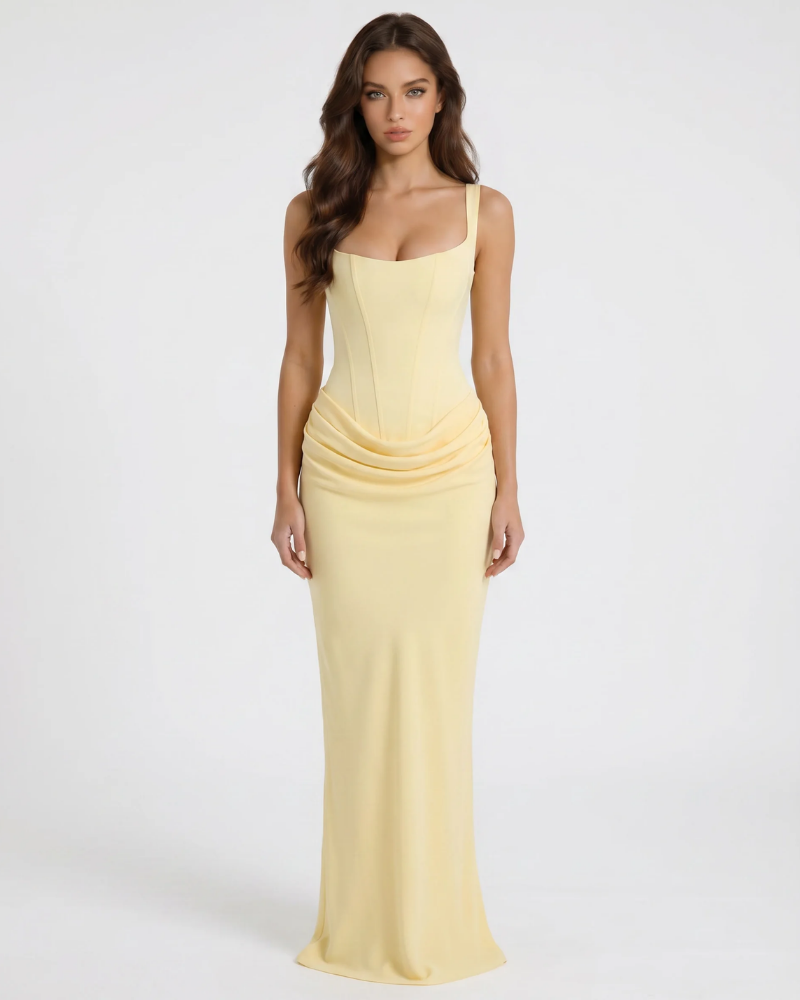 Yellow draped maxi dress with square neckline, corset-style seams, and fitted skirt