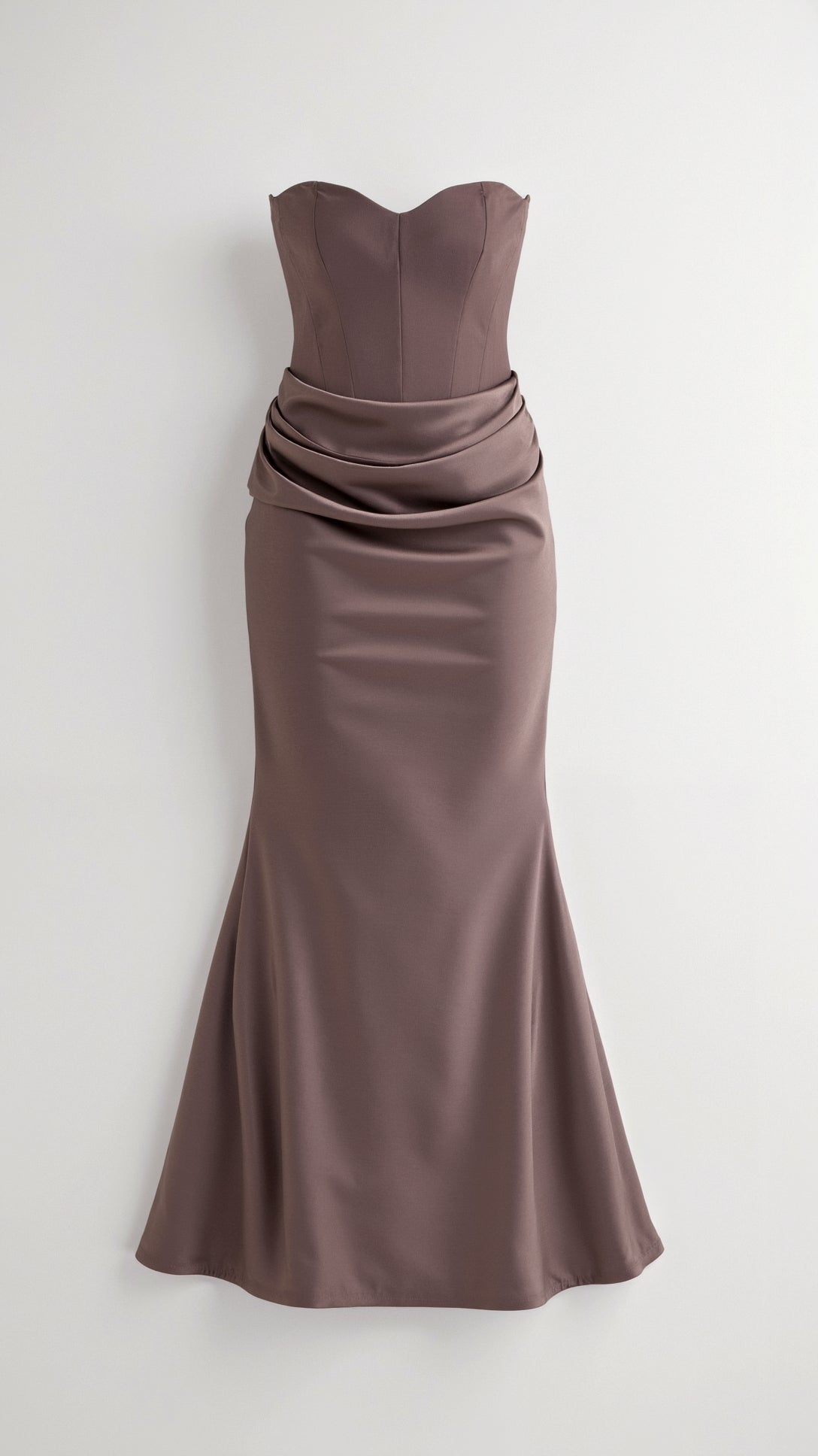 Mocha brown strapless maxi dress featuring a structured corset-style bodice and a beautifully draped, ruched waistline.