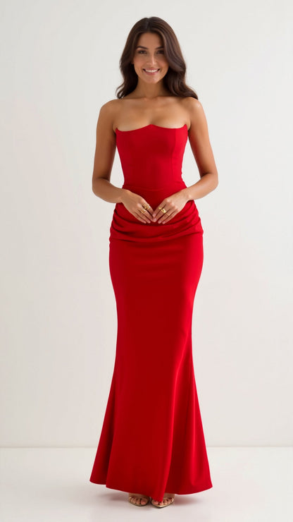 Vibrant red strapless Samira Draped Maxi Dress, featuring a smooth, form-fitting bodice and a sleek, floor-length skirt design.