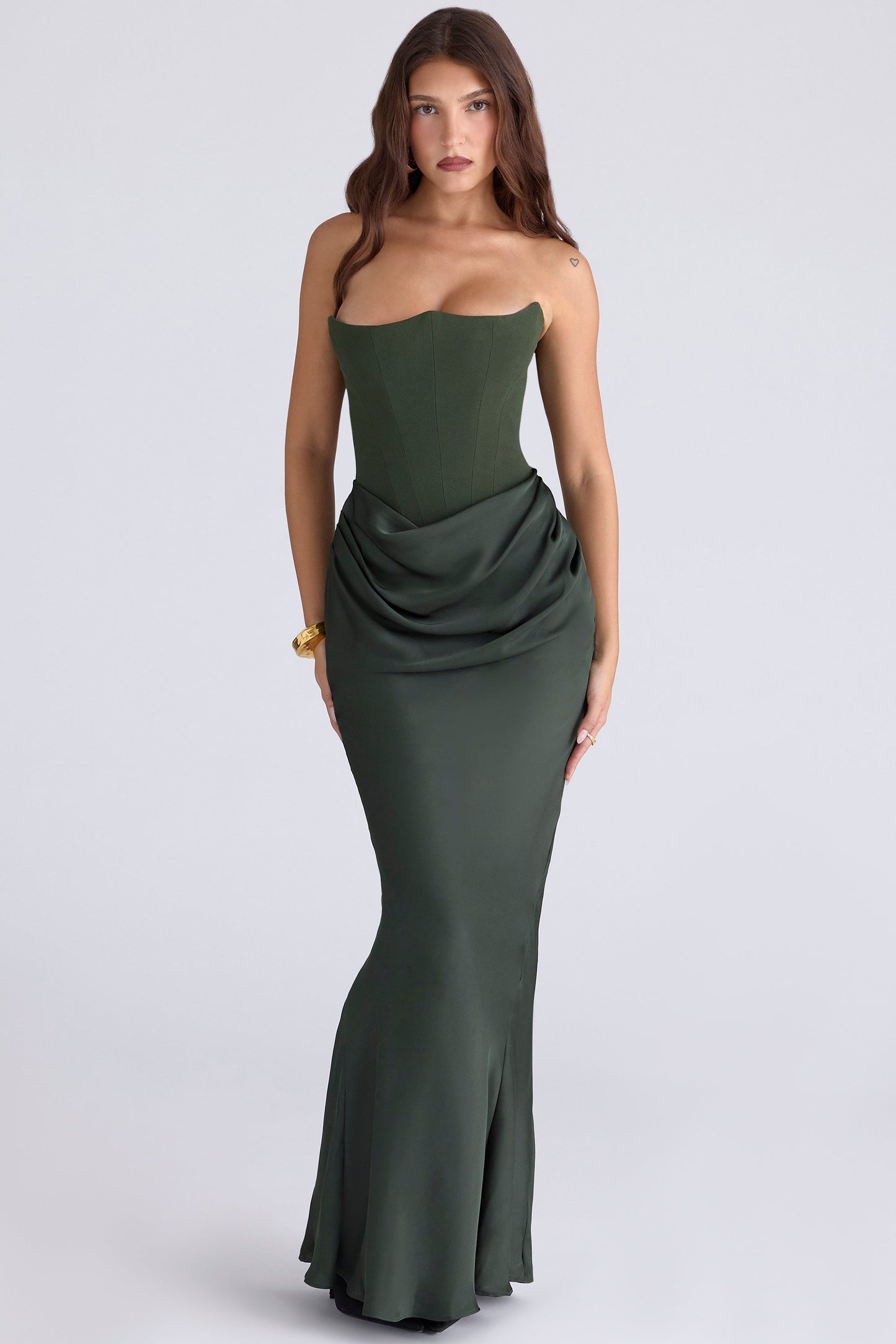 Full-length Samira Draped Maxi Dress in dark olive green, strapless with a structured corset bodice and elegant draped skirt detail.