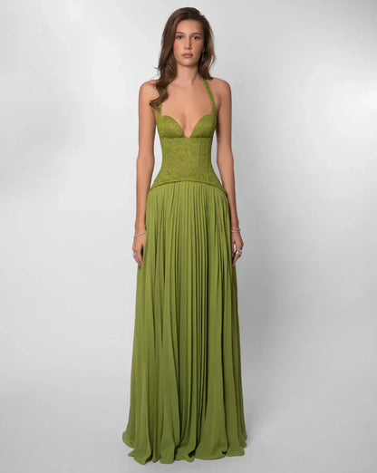 Green lace maxi dress with plunging halter neckline and pleated skirt for women, full front view.